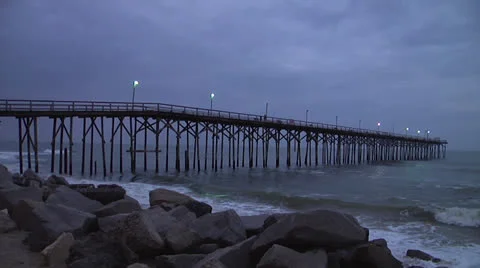 Pier and waves at dusk 2, 12fps Stock Footage 24433033