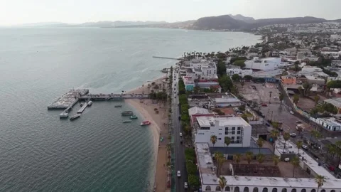 Pier Into the Azure: High-Angle Aerial Tracking of La Paz Bay Pier Stock Footage 340265186