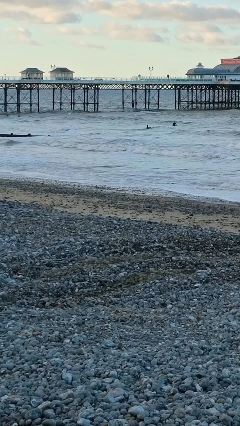 Pier on the beach at sunset Video stock 304392731