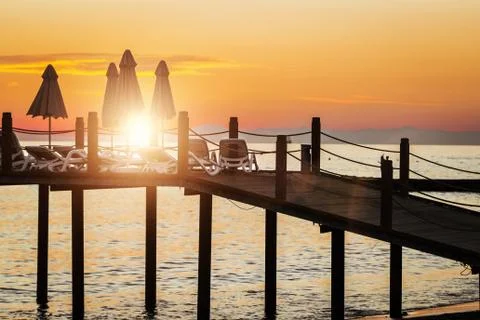 Pier at beautiful sunset Stock Photos