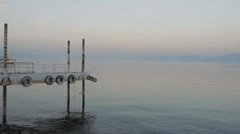 Pier in blue water Stock Footage 58607309