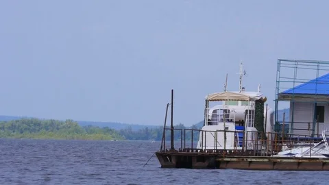 Pier for boats on the river Video stock 78364090