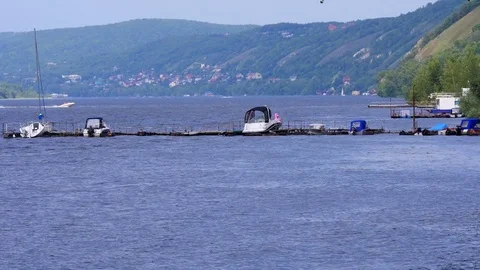 Pier for boats on the river Stock Footage 78367898