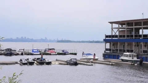 Pier with boats on the river Stock Footage 78380692