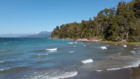 Pier in Bosque de Arrayanes with Nahuel Huapi lake in background, Villa La An Stock Footage 126843524