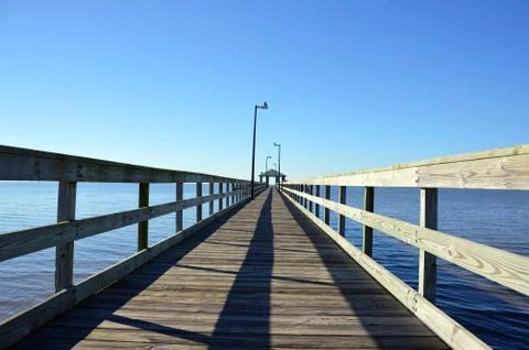 Pier to cloudless sky (2) Stock Photos