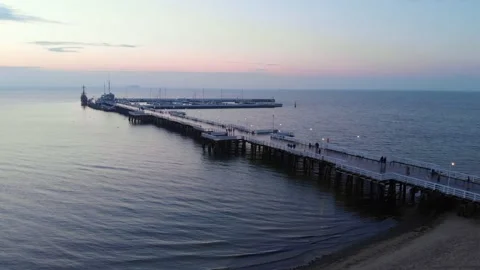 Pier During Sunrise - Aerial Stock Footage