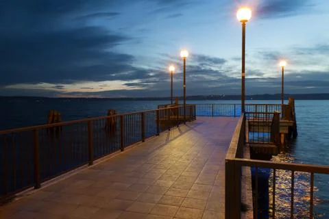 Pier at the dusk Stock Photos