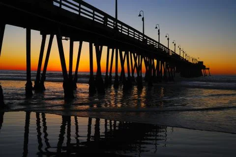 Pier at Dusk with Reflections Stock Photos