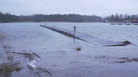 Pier flooded during a storm Stock Footage 132130138