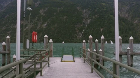 Pier on the lake in the mountains Stock Footage 81935693
