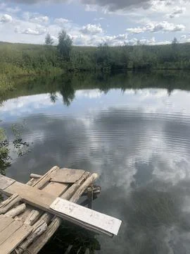 Pier on the lake Stock Photos