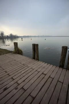 Pier on a lake Stock Photos