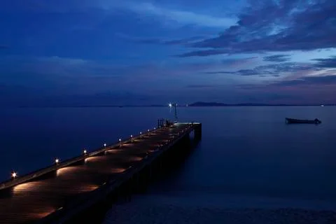 Pier on the ocean with lights Stock Photos