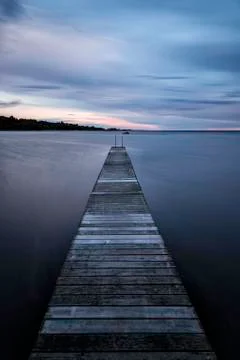 Pier into the Ocean Stock Photos