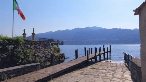 Pier in Orta with a View of the Lake and the Alps Stock Footage 339248922