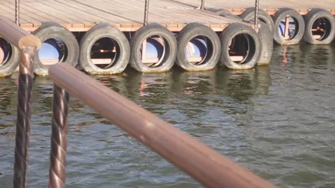 Pier over calm river from different angle Stock Footage 318452325