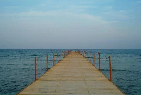 Pier over waters Stock Photos