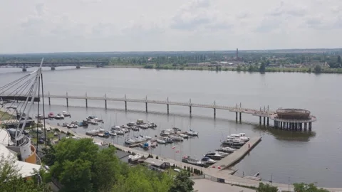 Pier with restaurant on the Vistula River seen from a high riverbank in Plock Video stock 331502139
