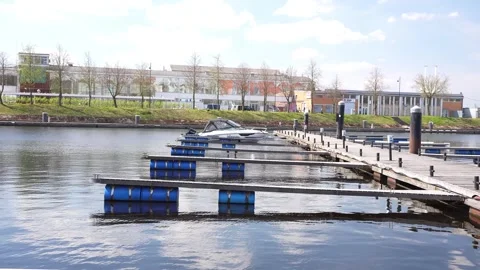 Pier in Riga, Latvia. May. Cloudy weather. A boat parked in the pier Stock Footage 276725520