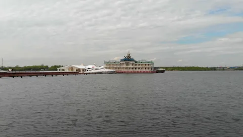 Pier on river with old soviet building. Aerial shot Stock Footage 156895048