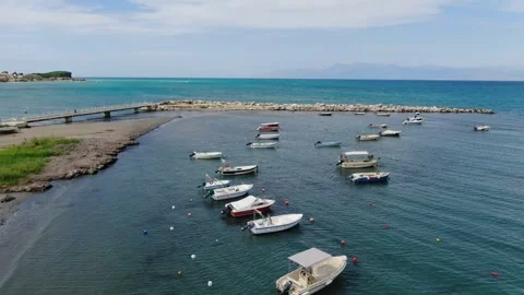 Pier in Roda beach corfu Greece Aerial view Stock Footage 297187089