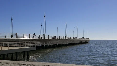 Pier in the sea on a clear day Stock Footage 101839392