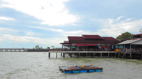 Pier by the sea with different buildings Stock Footage 64208782