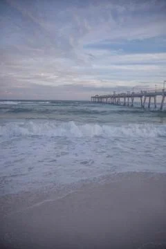 Pier From The Shore Vertical Stock Photos