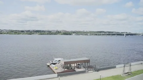 A pier on a small river where a boat was moored 库存影片 328299250