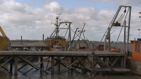 Pier with some moored boats Stock Footage 64971460