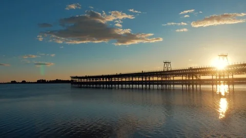 Pier in the sunset. The clouds Stock Footage 86689342