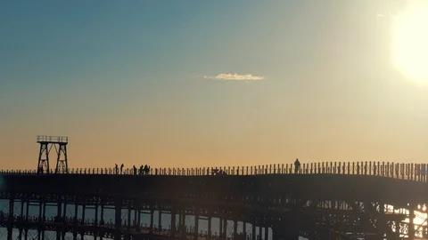 The pier is on the sunset Stock Footage 86644185