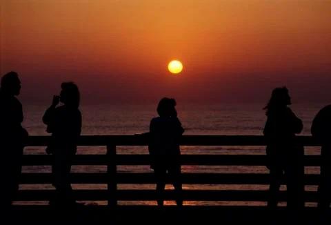 Pier at sunset Stock Photos