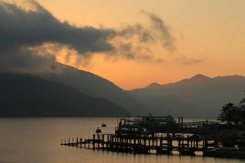 Pier at sunset Stock Photos