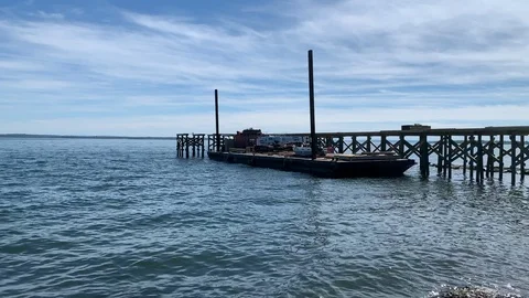 Pier under construction with barge  Rhode Island Summer Coastline 4K 스톡 동영상 115990823