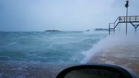 Pier Violent Gusts Waves from inside Car Stock Footage 97608115