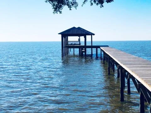 Pier on water Stock Photos