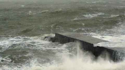Pierce covers a wave during a storm. Slow motion. 스톡 동영상 65298249