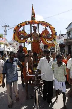 Pierced devotee on decorated cycle rickshaw discharging, Tirupparankundram... Stock Photos