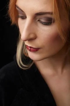 Pierced red lips Stock Photos
