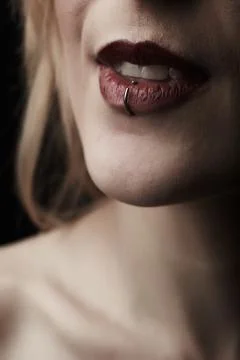 Pierced red lips Stock Photos