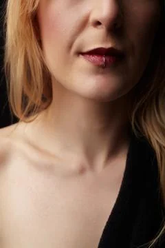 Pierced red lips Stock Photos