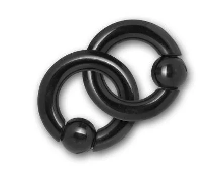 Piercing earrings isolated on white background Stock Photos