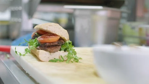 Piercing with a Pike through Sandwich Stock Footage 111768664