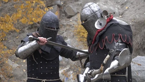 Piercing a warrior's sword on the battlefield. Stock Footage 81668419