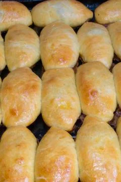 Pies on a baking sheet Stock Photos