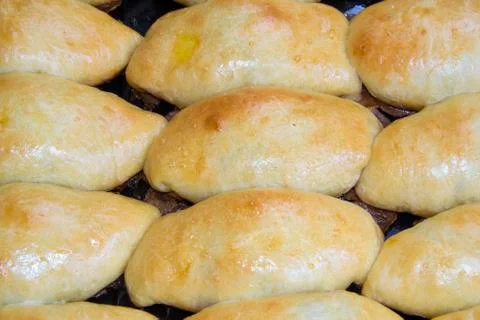 Pies on a baking sheet Stock Photos