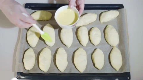 Pies on a baking sheet.The process of making pies. Stock Footage 167261186