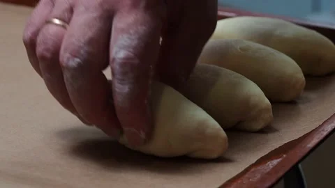 Pies on a baking tray. Stock Footage 229688523